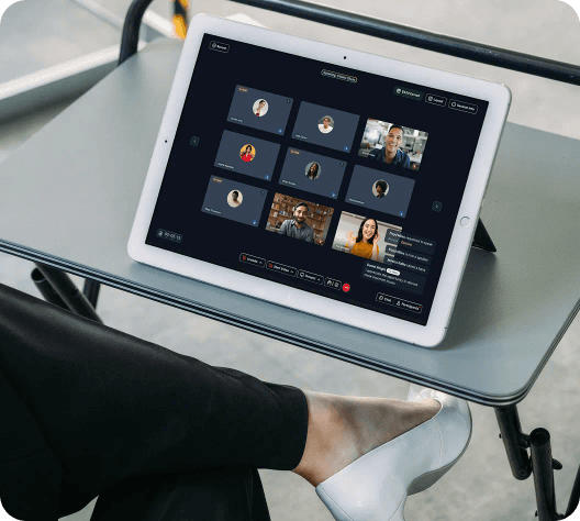 Fireside Chat session on a tablet with a grid of live participants