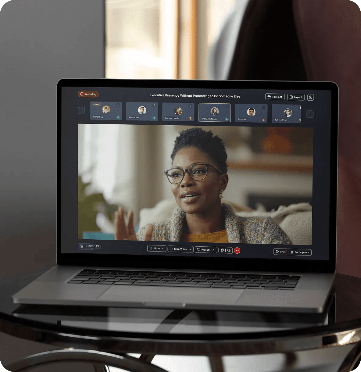 Laptop showing a live Fireside Chat session with participants